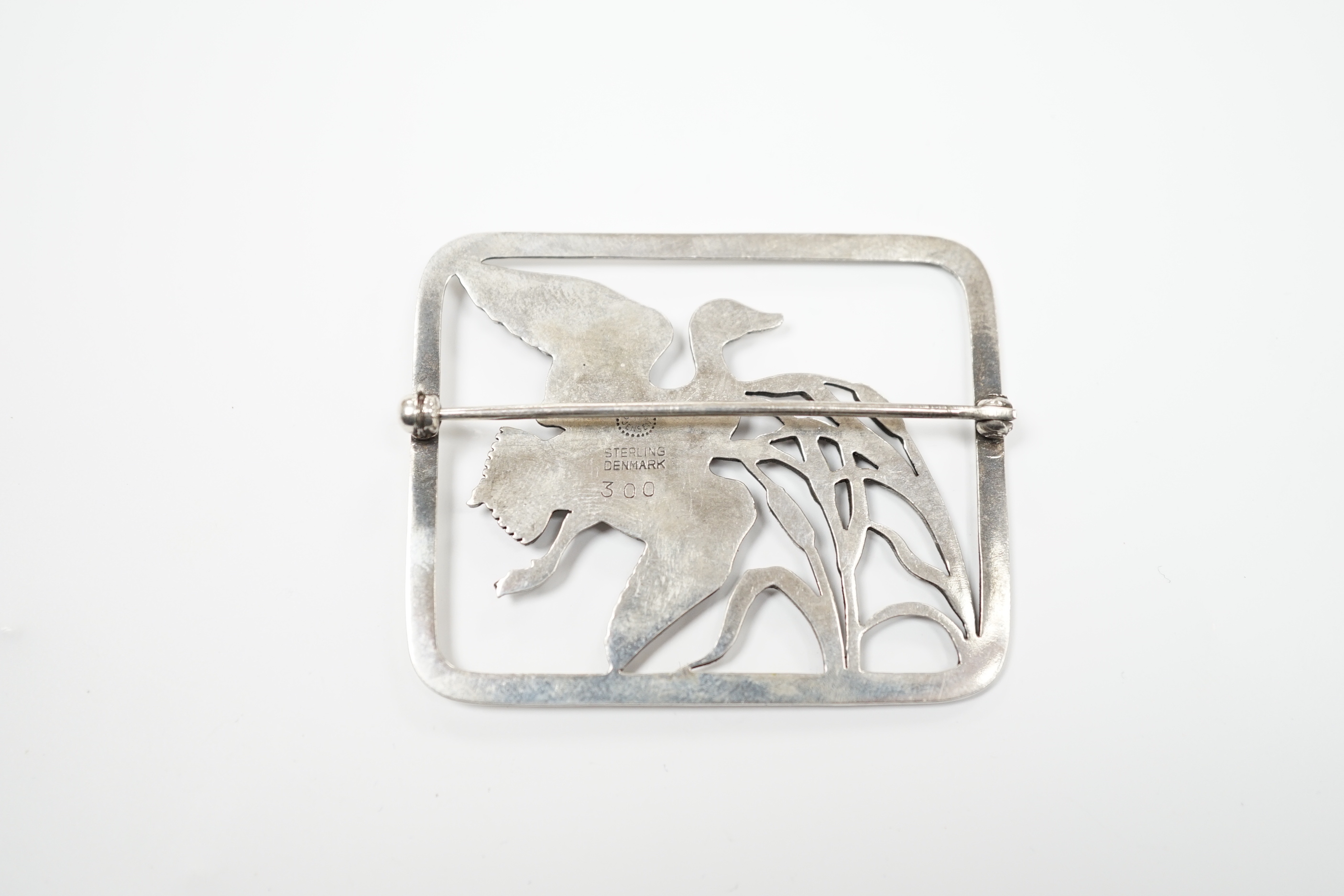 A Georg Jensen sterling 'duck in flight amid bulrushes' rectangular brooch, design no. 300, 47mm.
